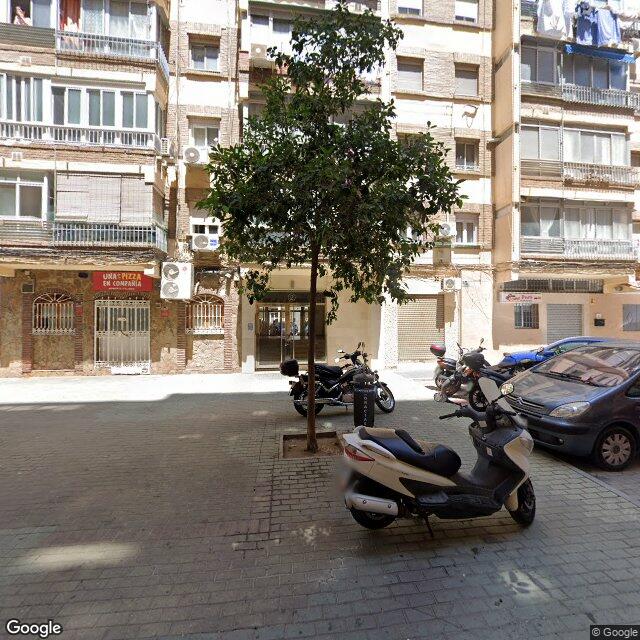 Street view near Farmacia Nova in Málaga