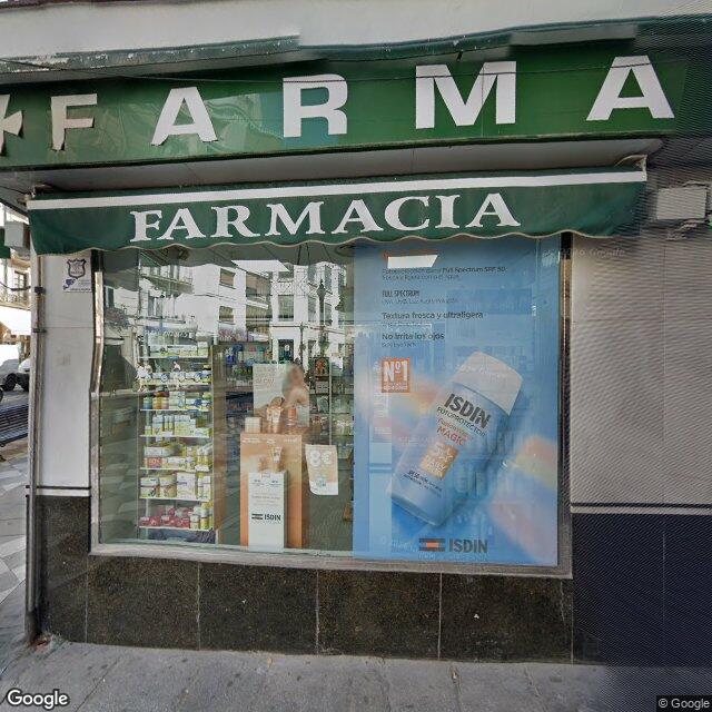 Street view near Farmacia Olivares in Granada