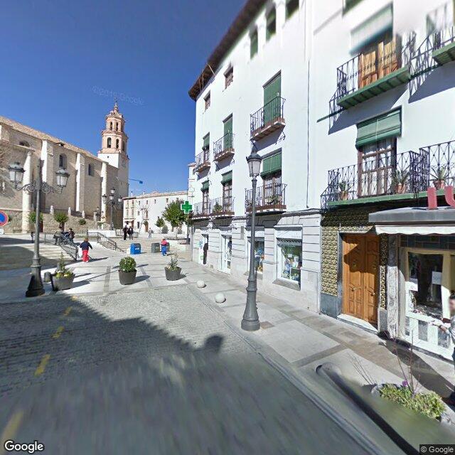 Street view near Farmacia Ortega in Spain