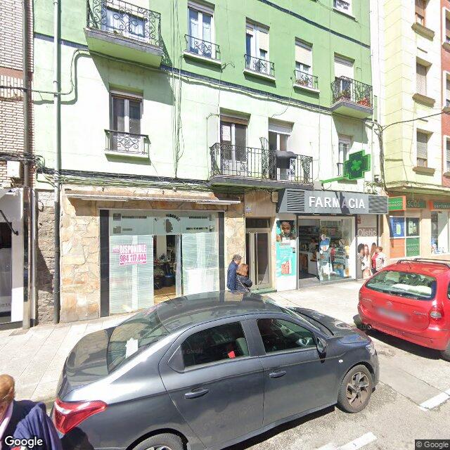 Street view near Farmacia Paula Calzón in Mieres del Camín
