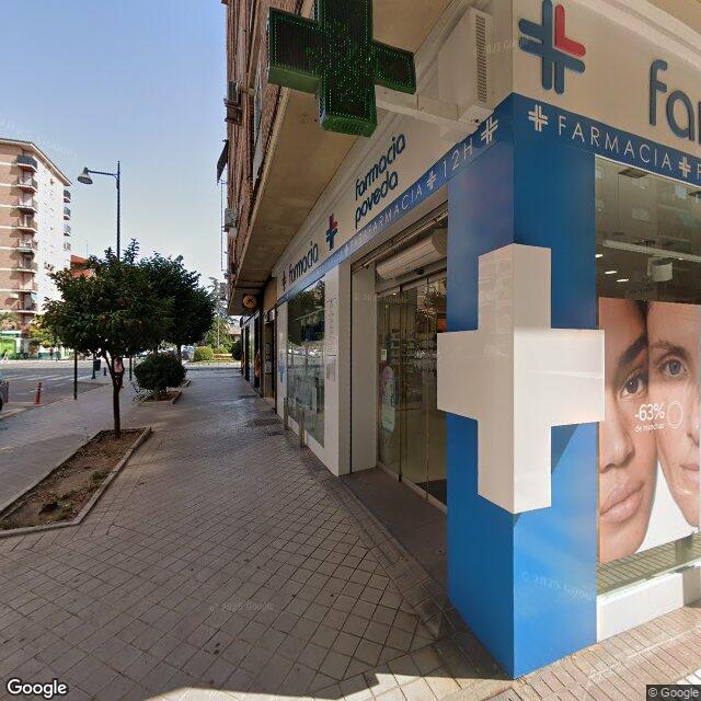 Street view near Farmacia Poveda in Granada