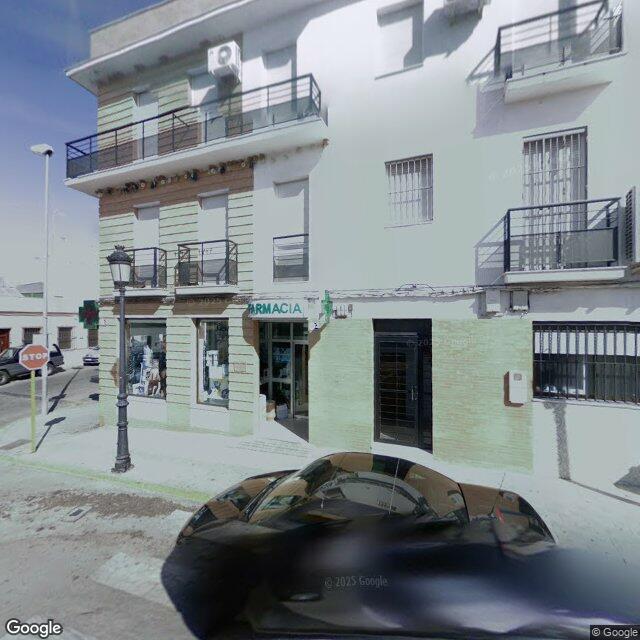Street view near Farmacia San José in Coria del Río