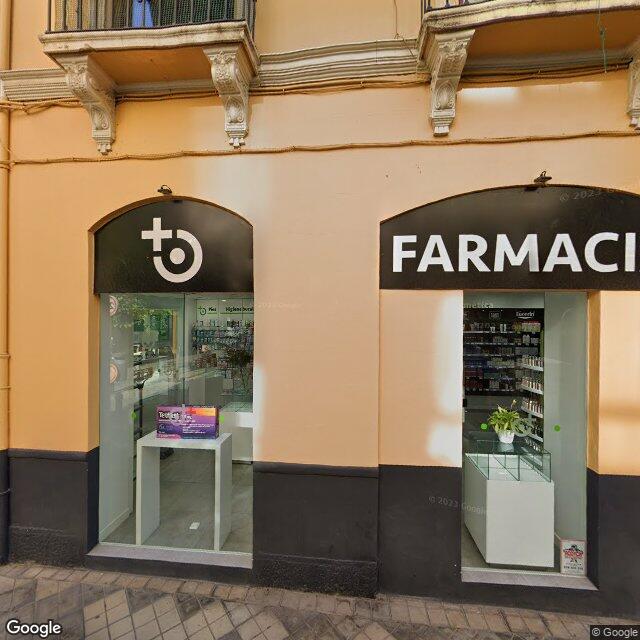 Street view near Farmacia San José in Granada