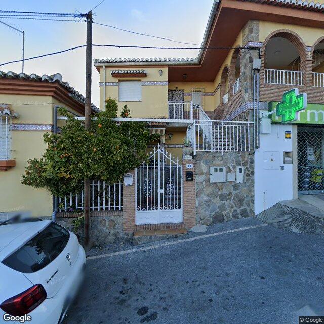 Street view near Farmacia San José in Monachil
