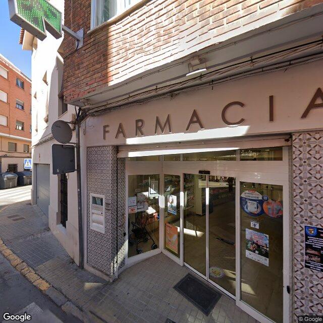 Street view near Farmacia San Roque in Spain