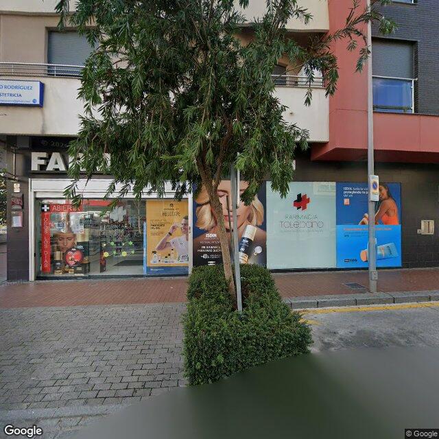 Street view near Farmacia Toledano in Spain