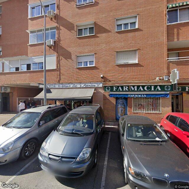 Street view near Farmacia Torrado in Spain